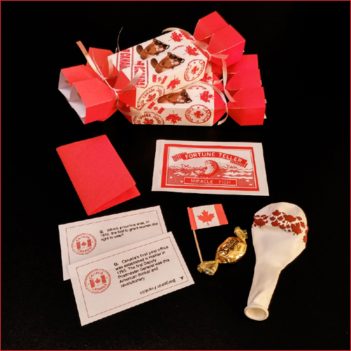 Canada's 150th Birthday Party Crackers with balloon, paper hat, Fortune Fish, Maple Leaves Balloon.  Red and White.